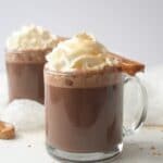 caramel spoon hot chocolate in mug