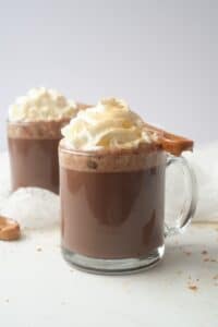 caramel spoon hot chocolate in mug